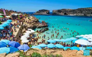 The Blue Lagoon Malta located on the island of Comino offers dazzling turquoise waters that attracts thousands of visitors a year.