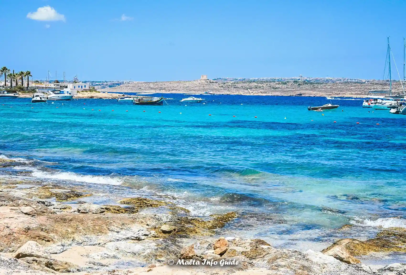 Turquoise Armier waters looking across toward nearby Comino.