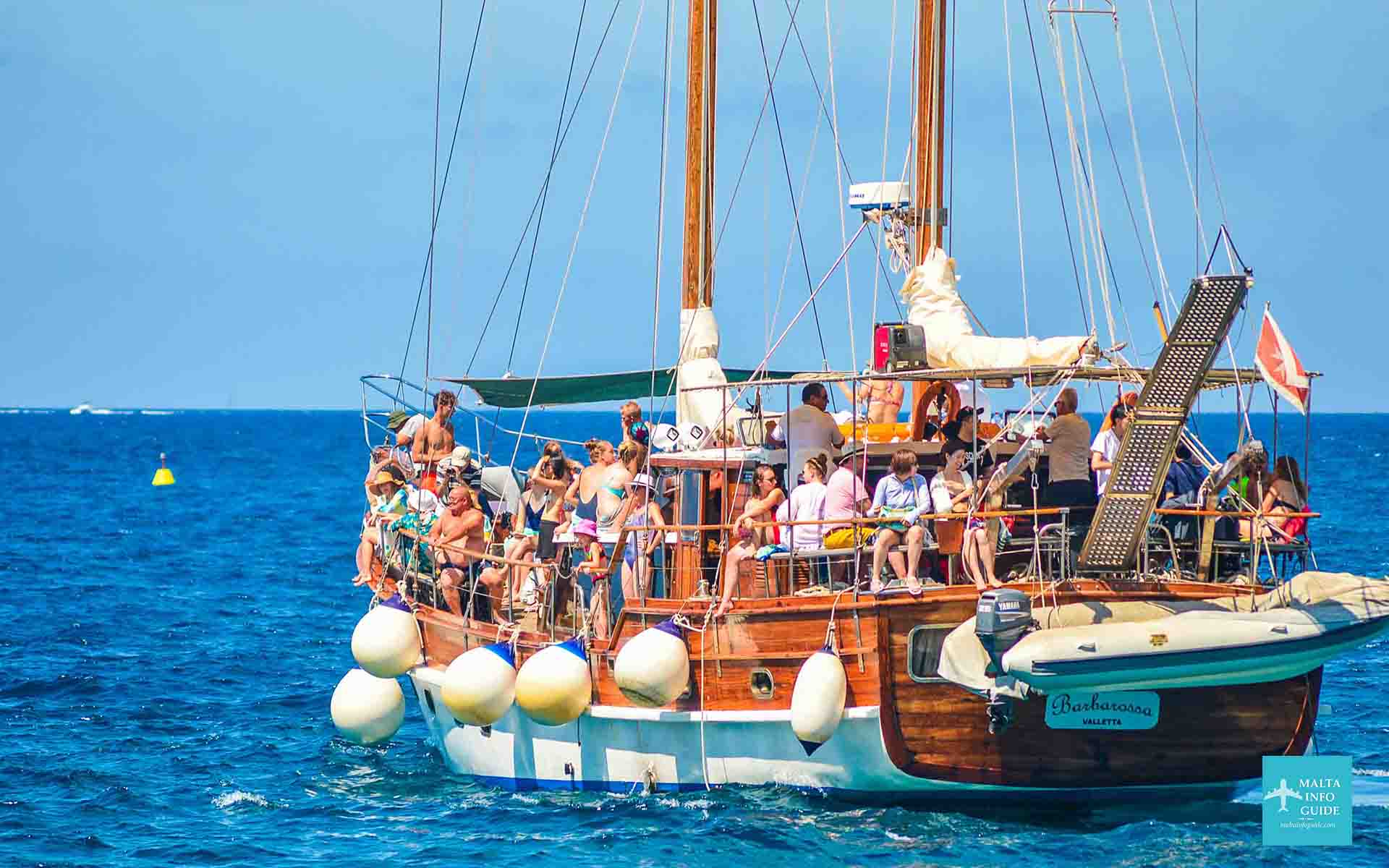 People on a Fernandes Tour To Comino Island Malta.