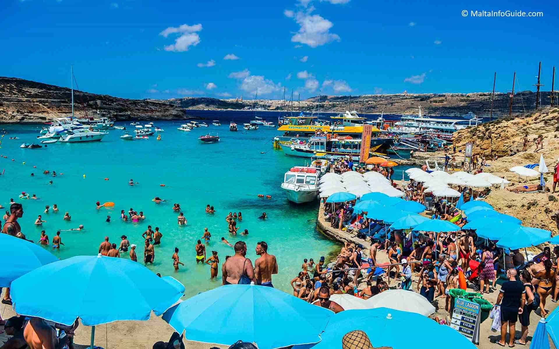 People swimming at Blue Lagoon Comino Malta