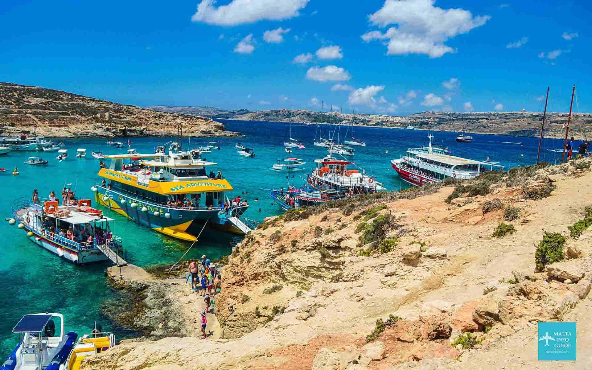 A number of Comino Malta cruises moored at the Blue Lagoon Malta.