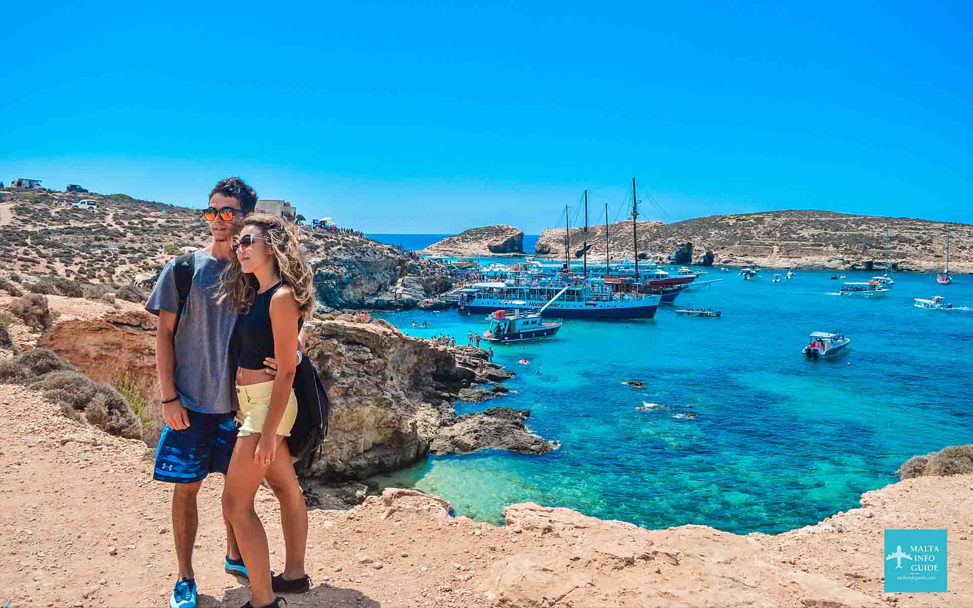 A couple posing in front of Blue Lagoon