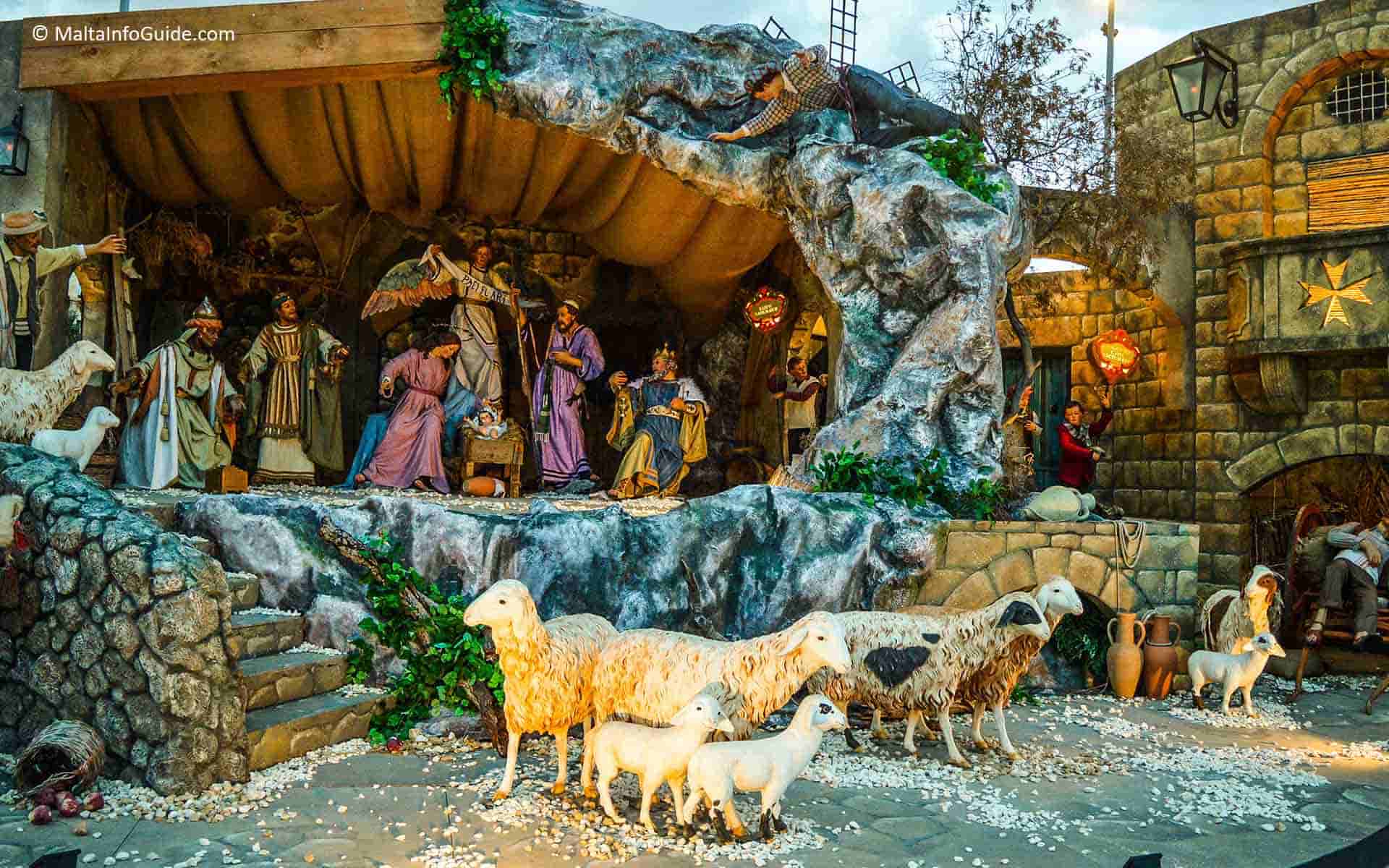 A large Christmas crib with large Maltese Christmas crib characters. A Maltese outdoor Christmas crib exhibited at Valletta.