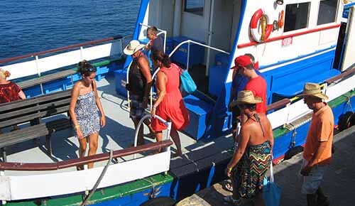 Tourists boarding the Comino hotel ferry
