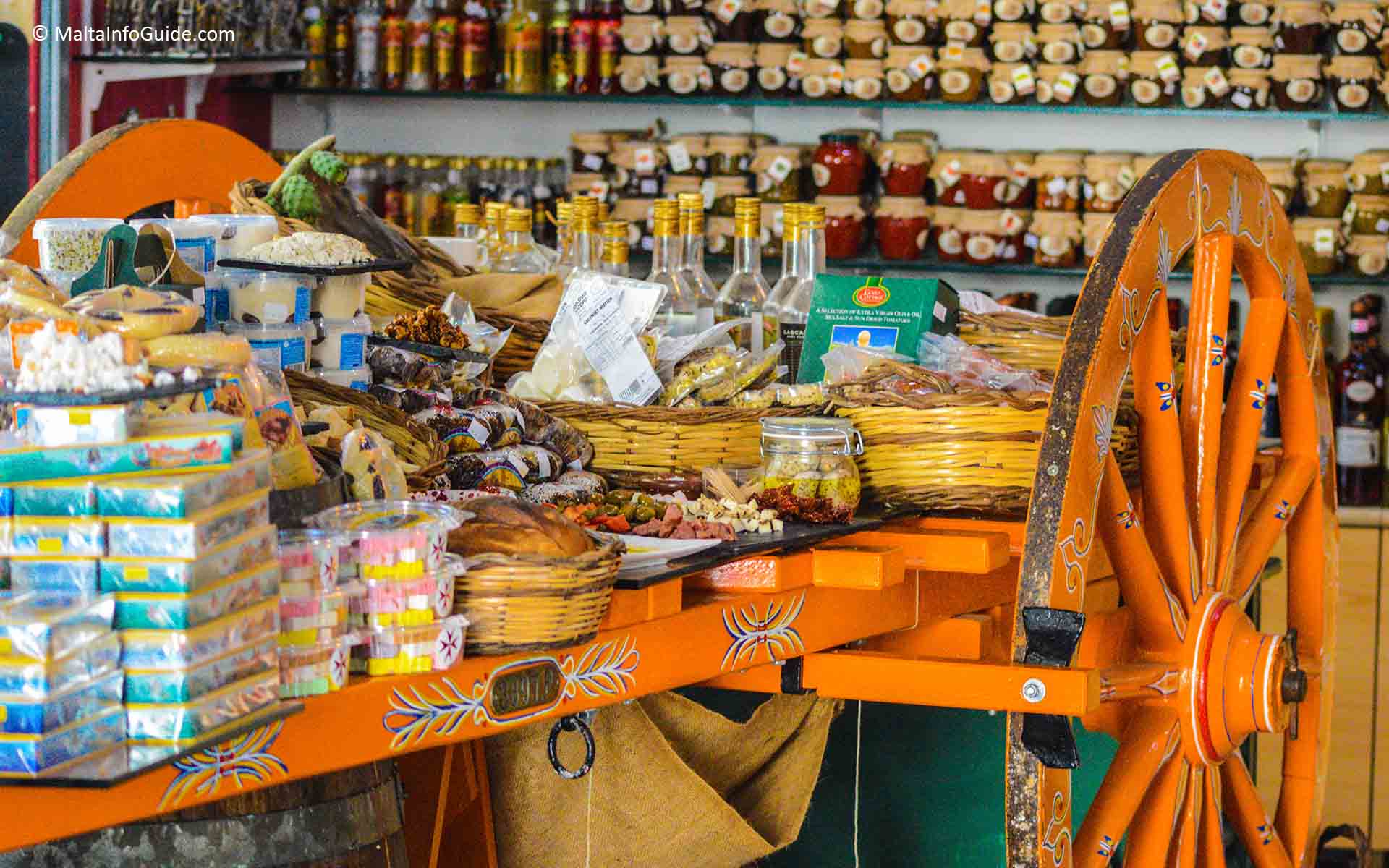 Different Maltese food specialities on an old cart.