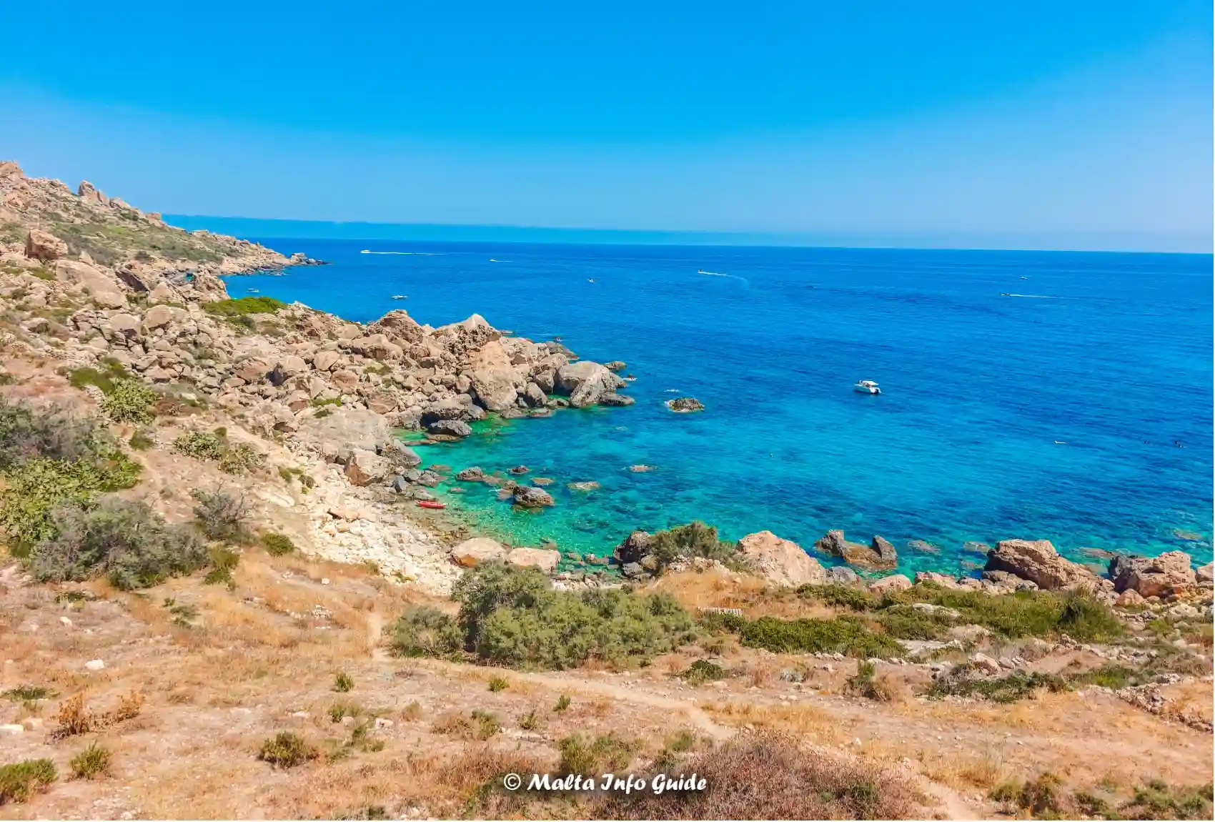 Rocky Gozo coastline overlooking blue sea near Dahlet Qorrot.