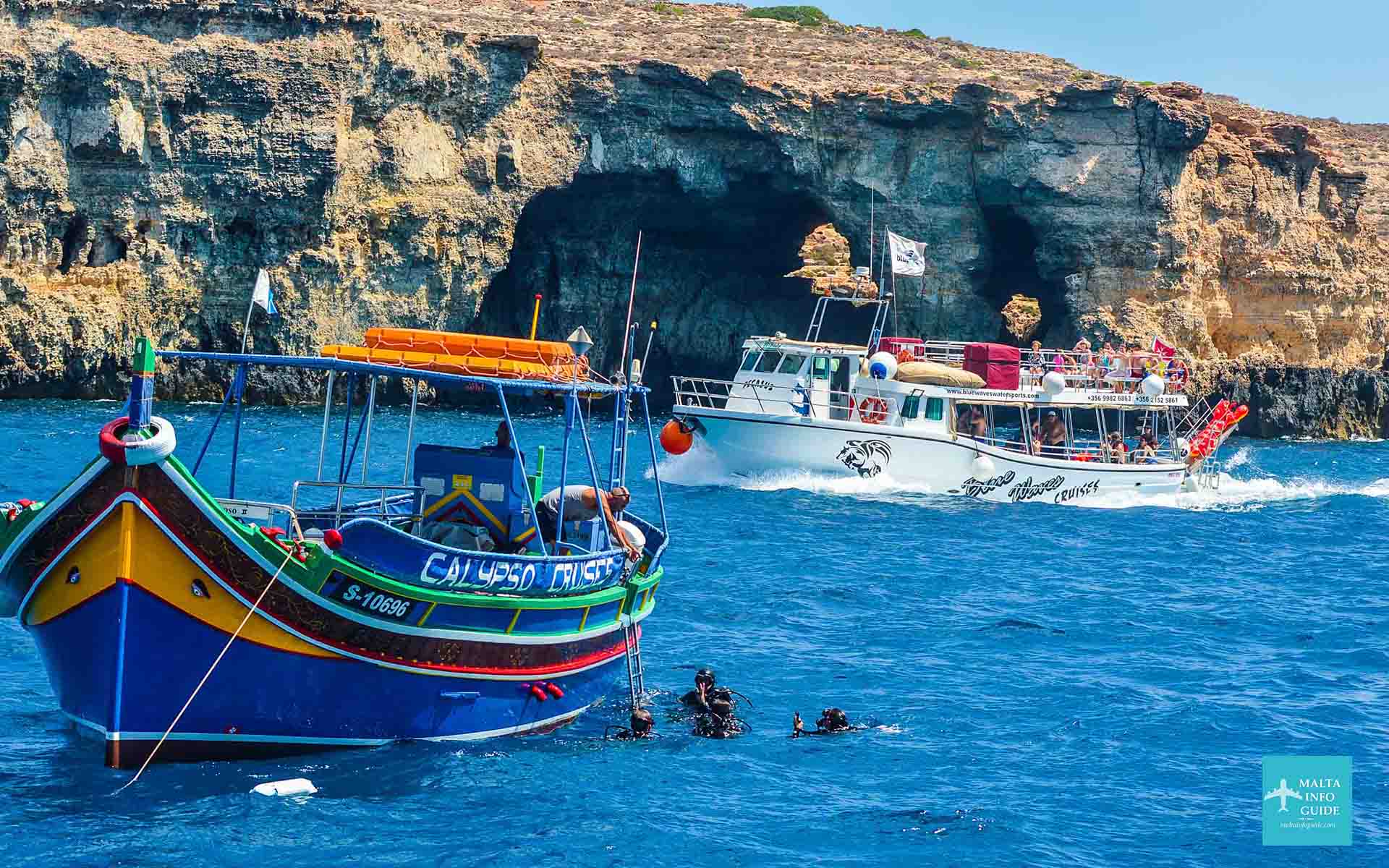 Divers preparing to dive at one of the wrecks found near Comino island Malta.