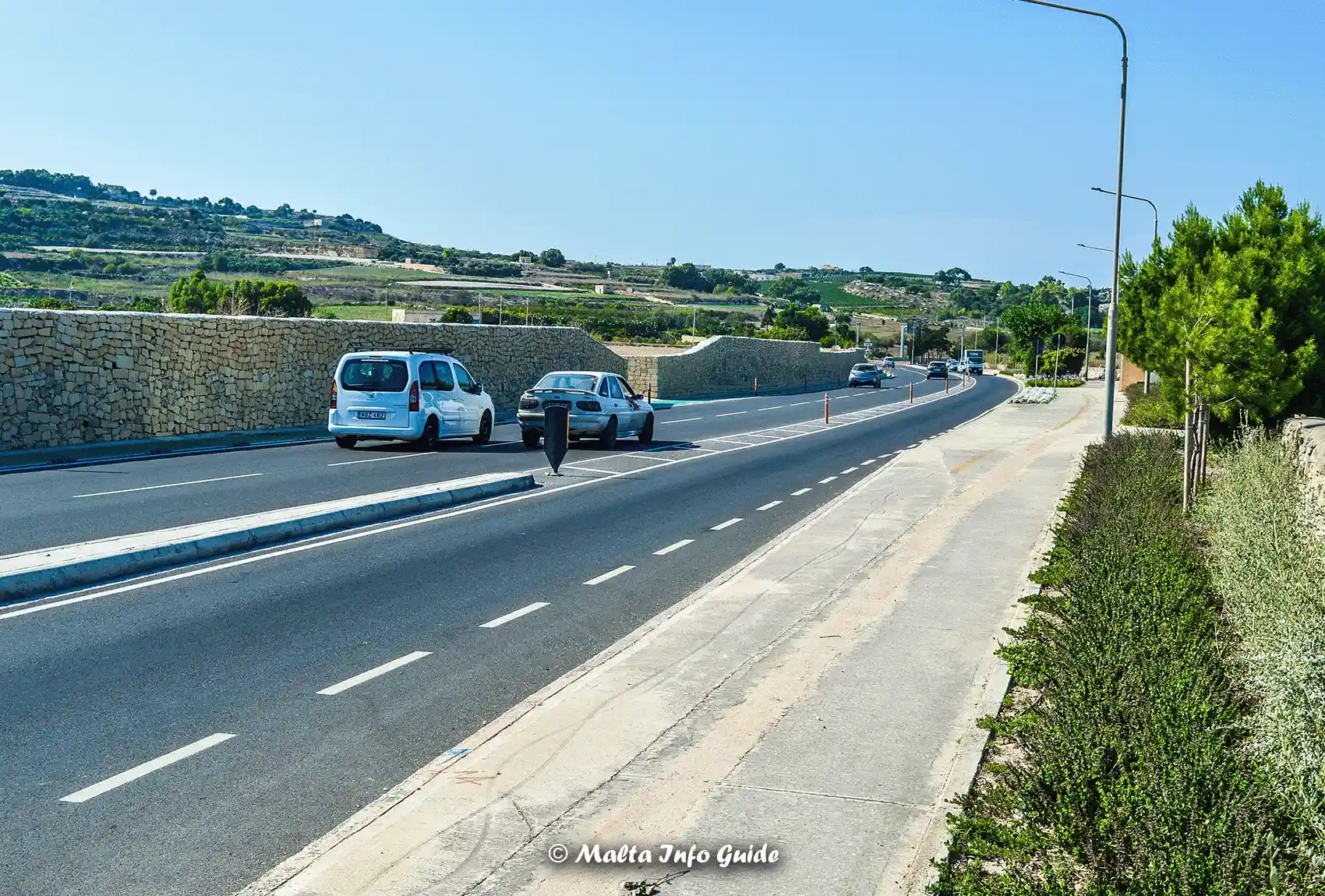 Cars travelling on a modern main road Malta.