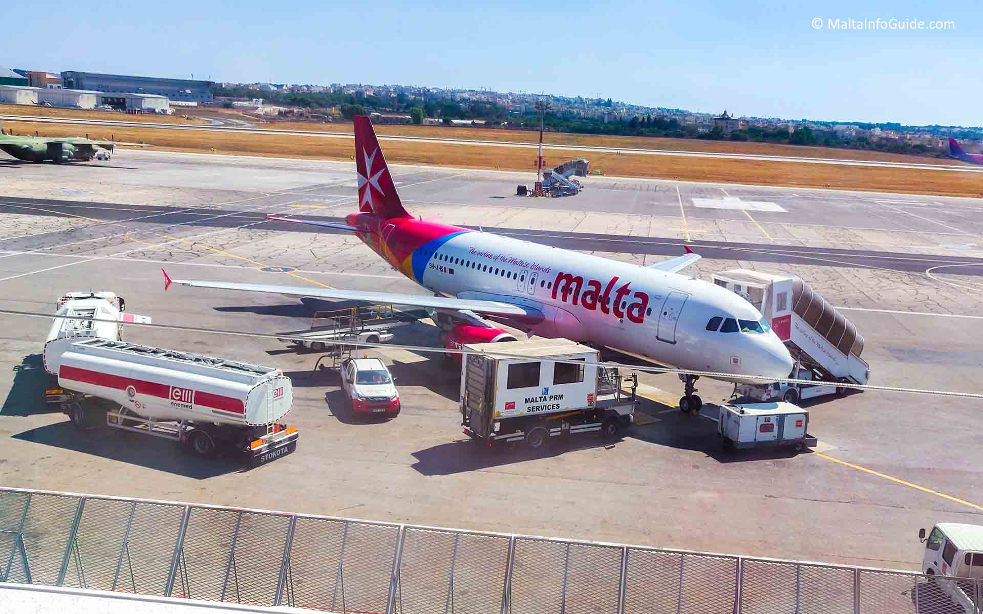 The best way of getting to Malta. Air Malta being loaded with fuel, luggage's and passengers.