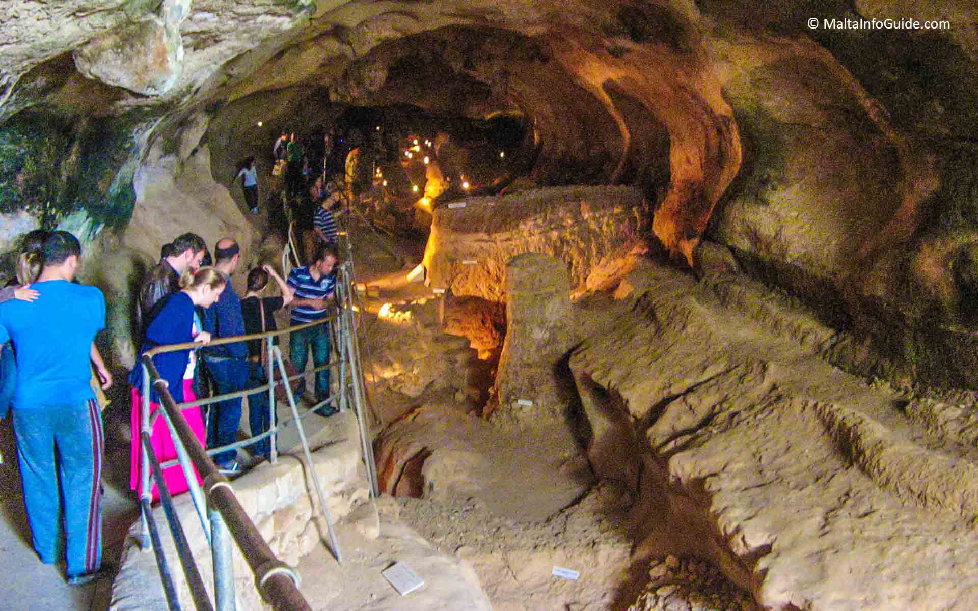 People in the Ghar Dalam cave Malta.
