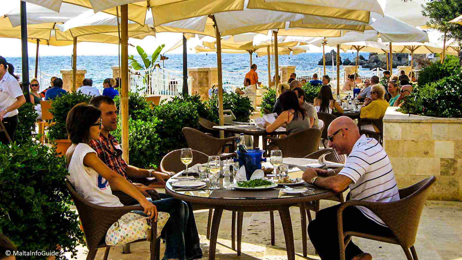 People eating at a restaurant at the 5 Star hotel.