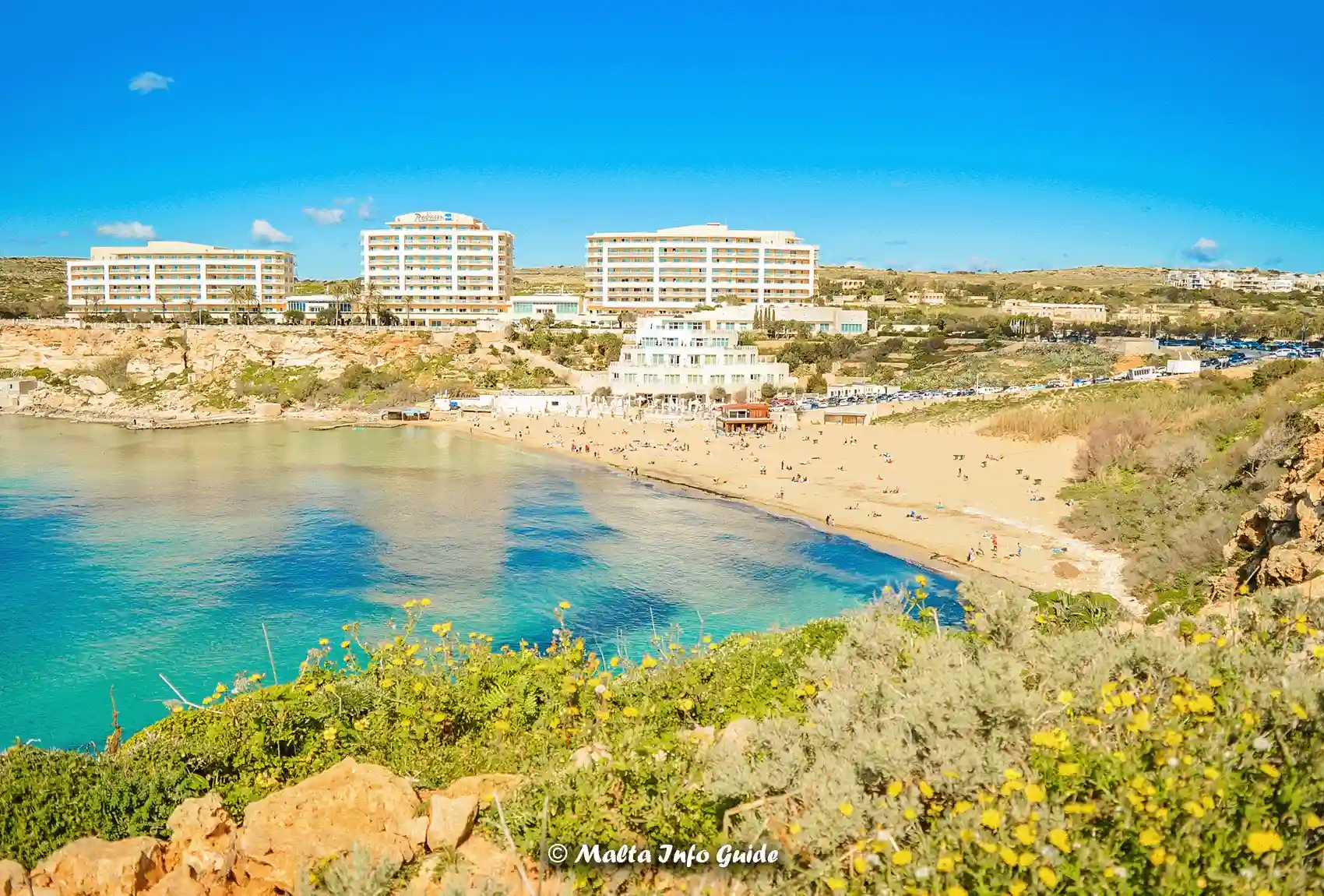 Golden Bay beach with Radisson Blu resort behind.