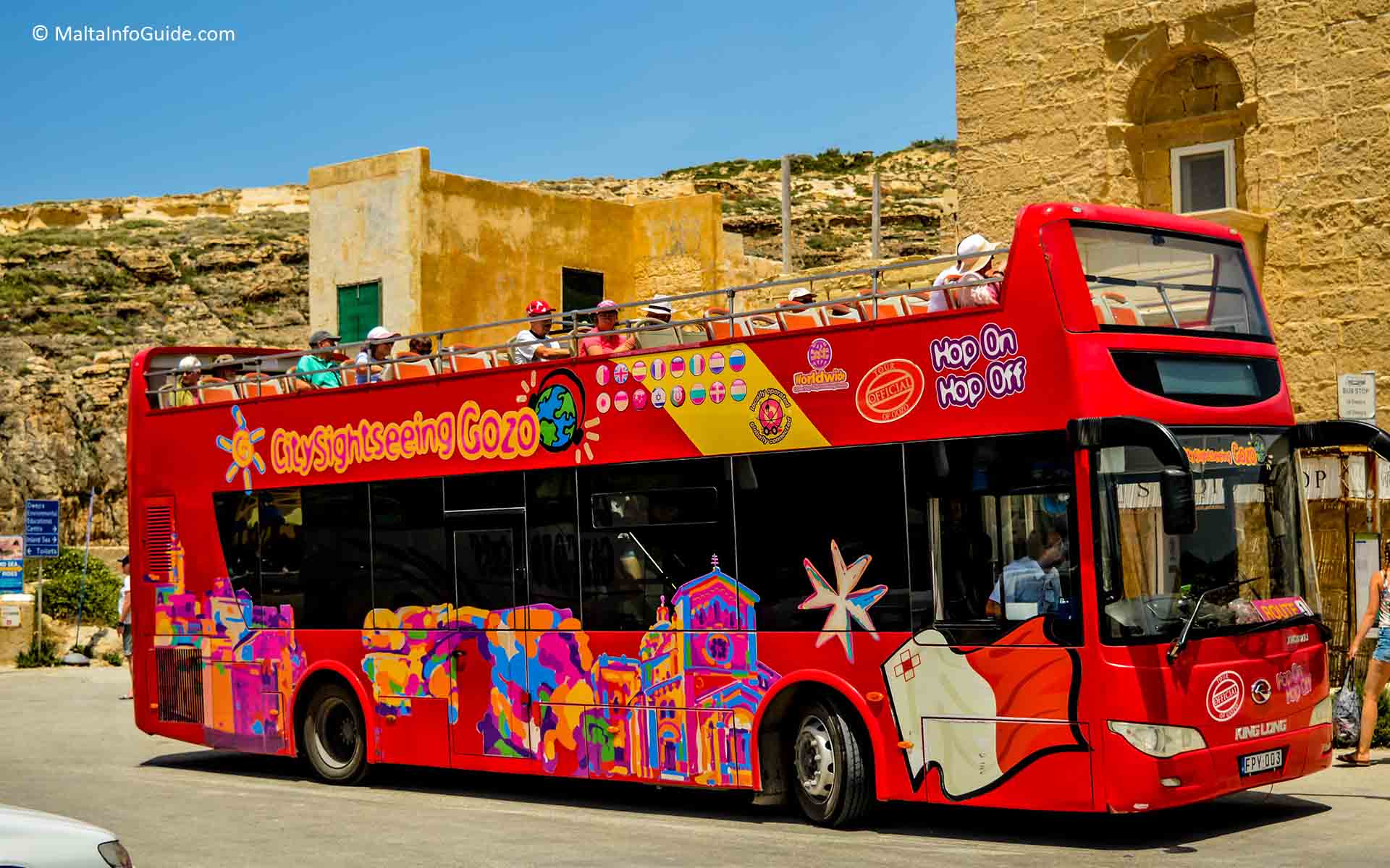 A Gozo sightseeing bus on the move near Ta' Pinu.