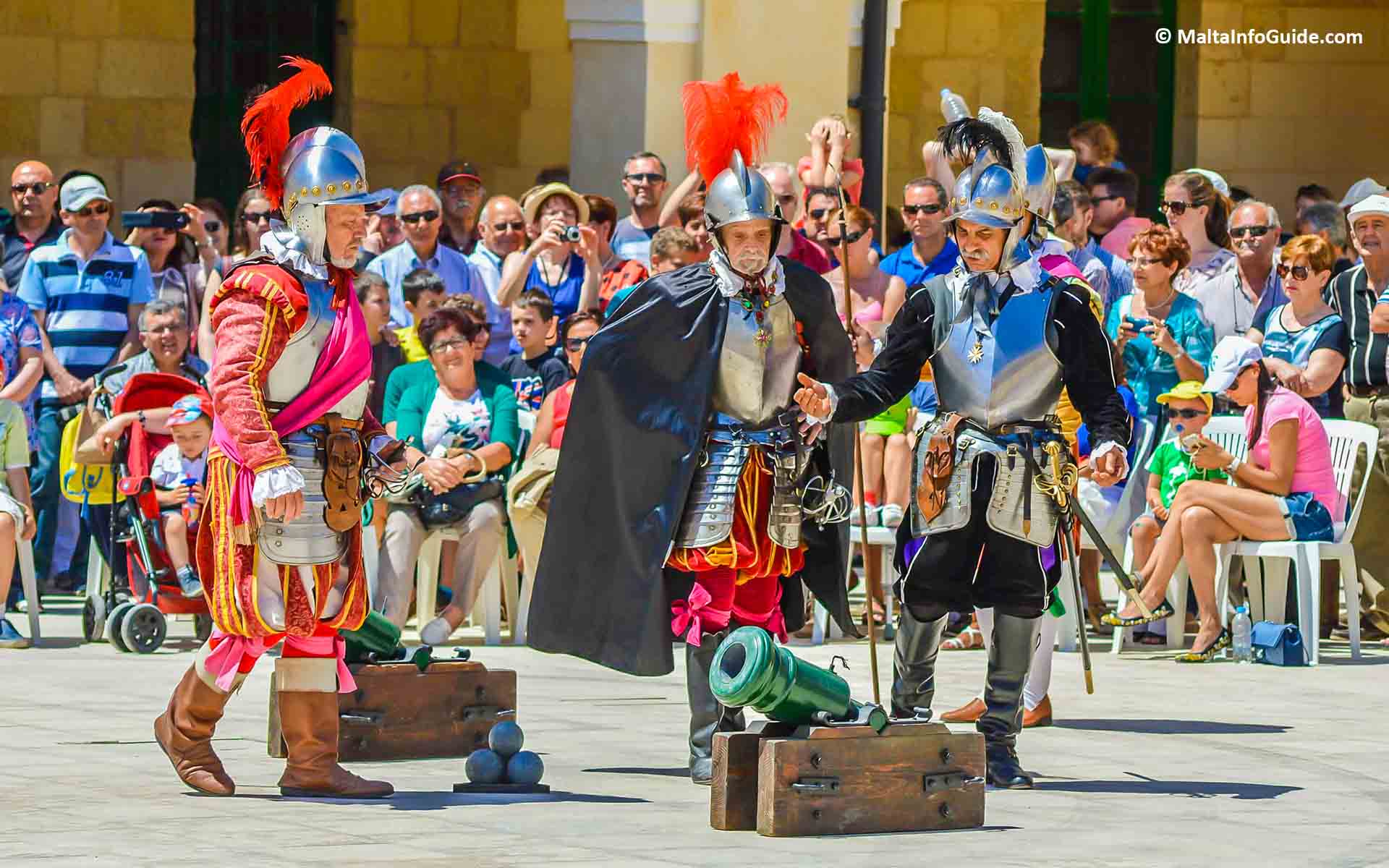 Three knights inspecting the cannons. Three knights inspecting the cannons.