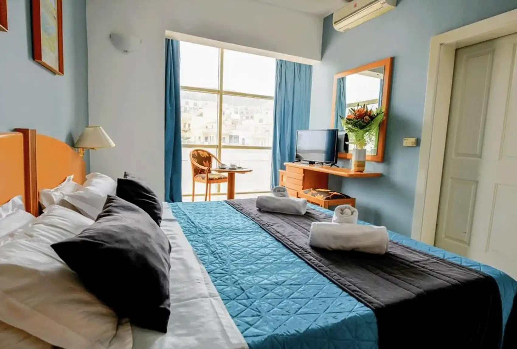 An attractive double room with a balcony at the La Playa Hotel, Marsalforn, Gozo, Malta.