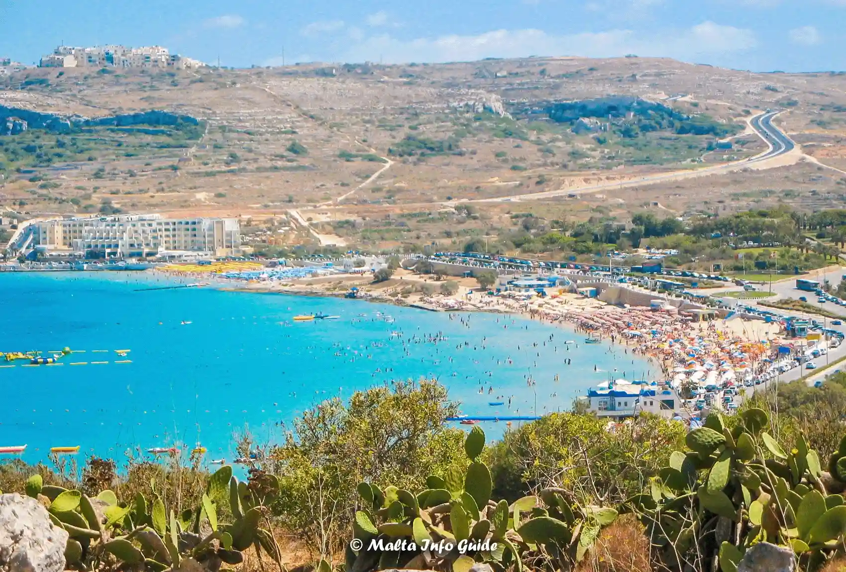 Elevated view across Mellieha Bay showing beach and shoreline.