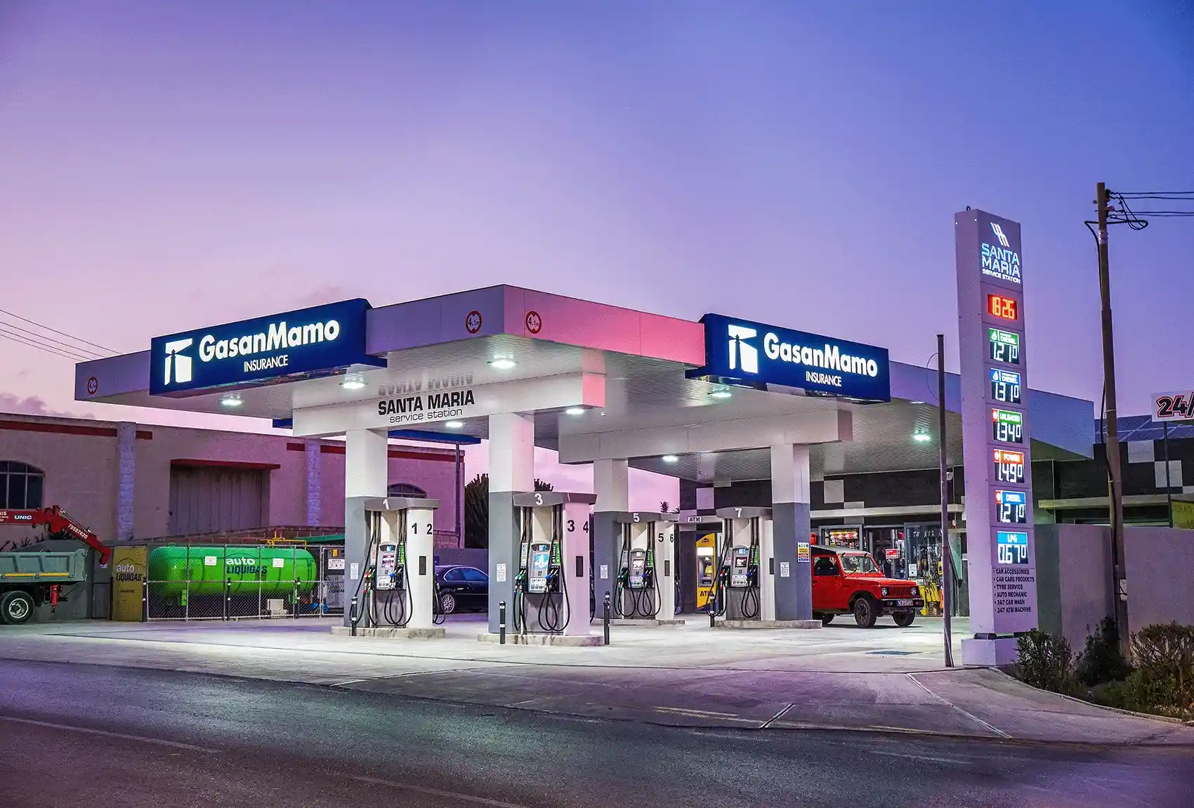 Santa Maria petrol station illuminated at dusk, Malta.