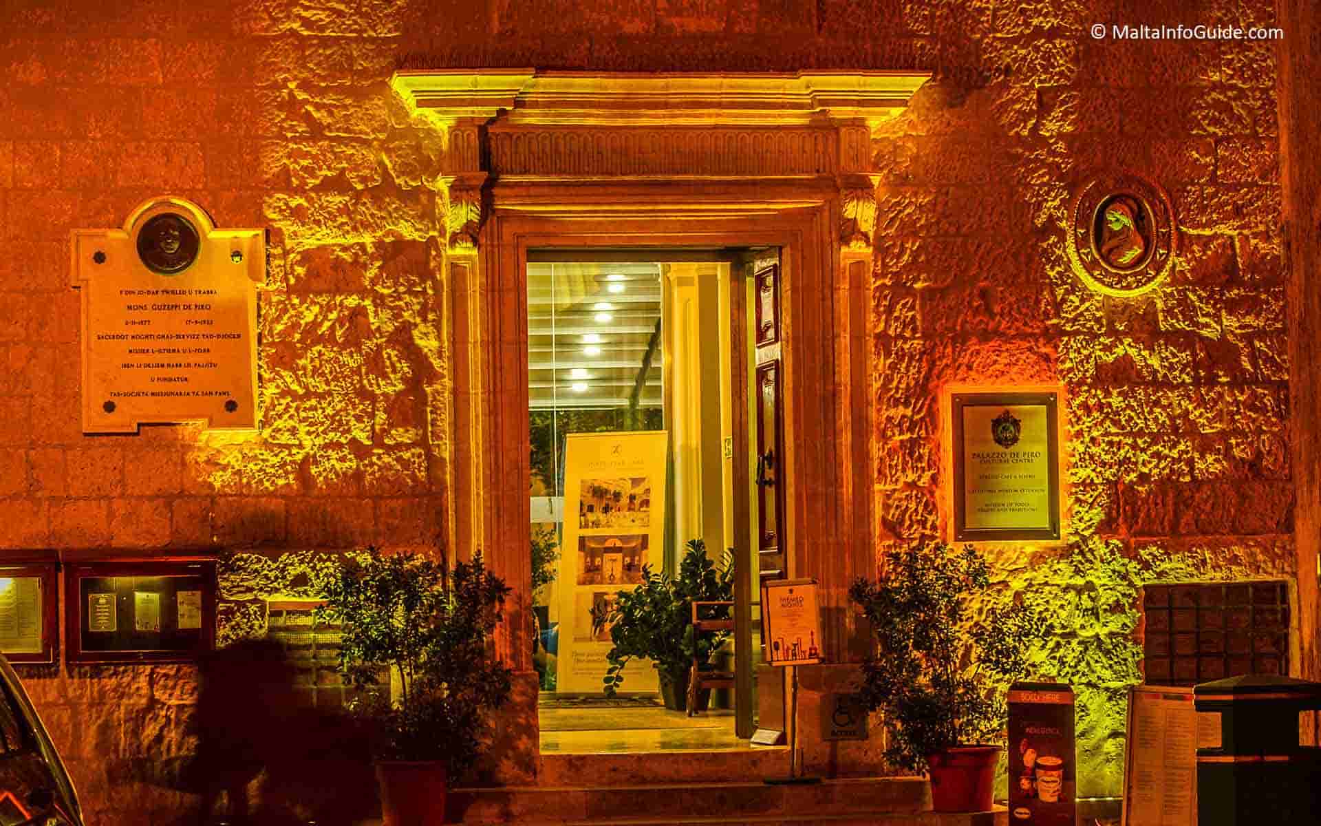 Facade of Palazzo De Piro in Mdina Malta lit up.