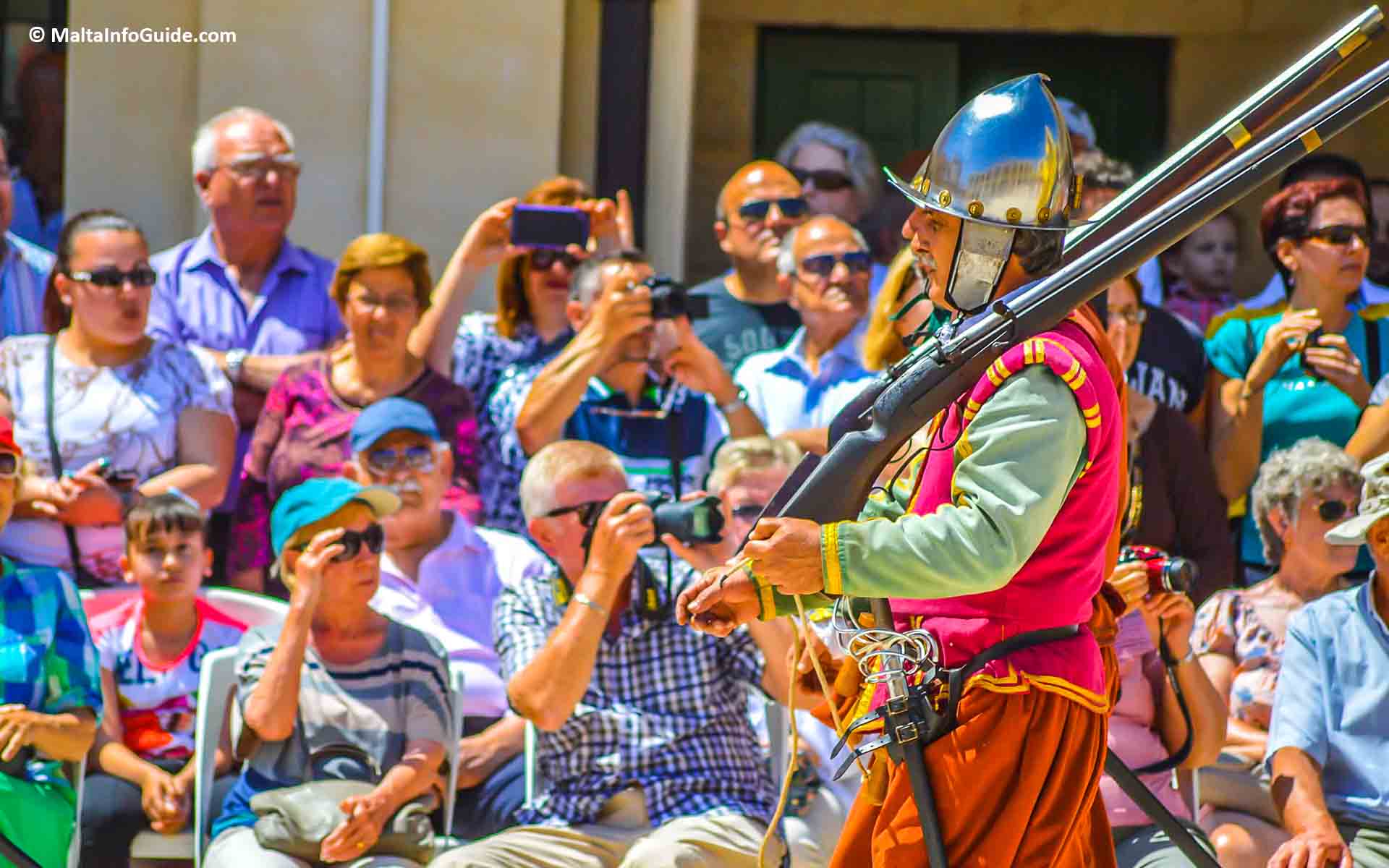 Men carrying guns on their shoulders. Men carrying guns on their shoulders.