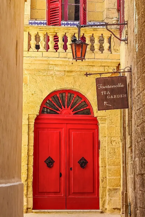 A prominent red door in Mdina Malta.