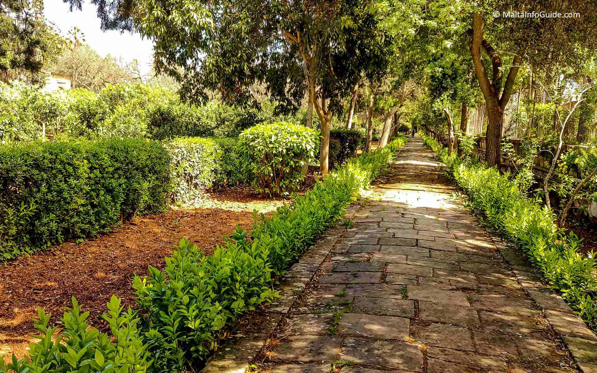 A long pathway at San Anton Gardens.