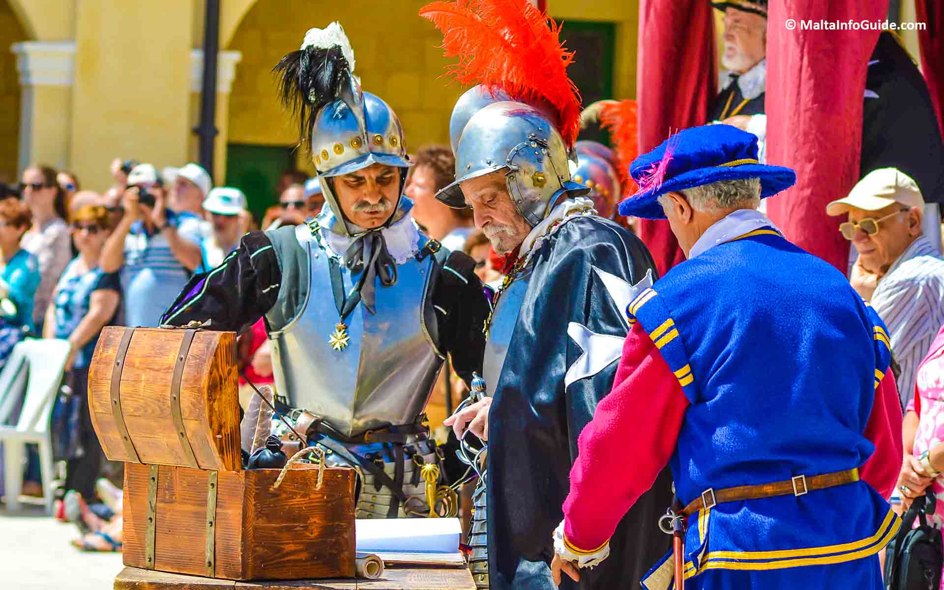 Three men signing an order during the knights. Three men signing an order during the knights.