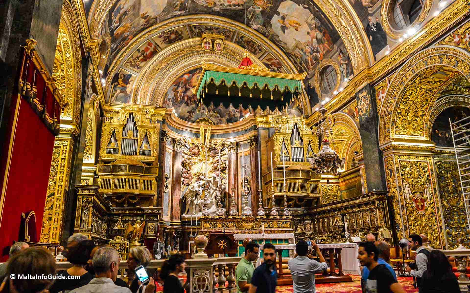 People taking photos and walking around St. John's Co-Cathedral. People taking photos and walking around St. John's Co-Cathedral.