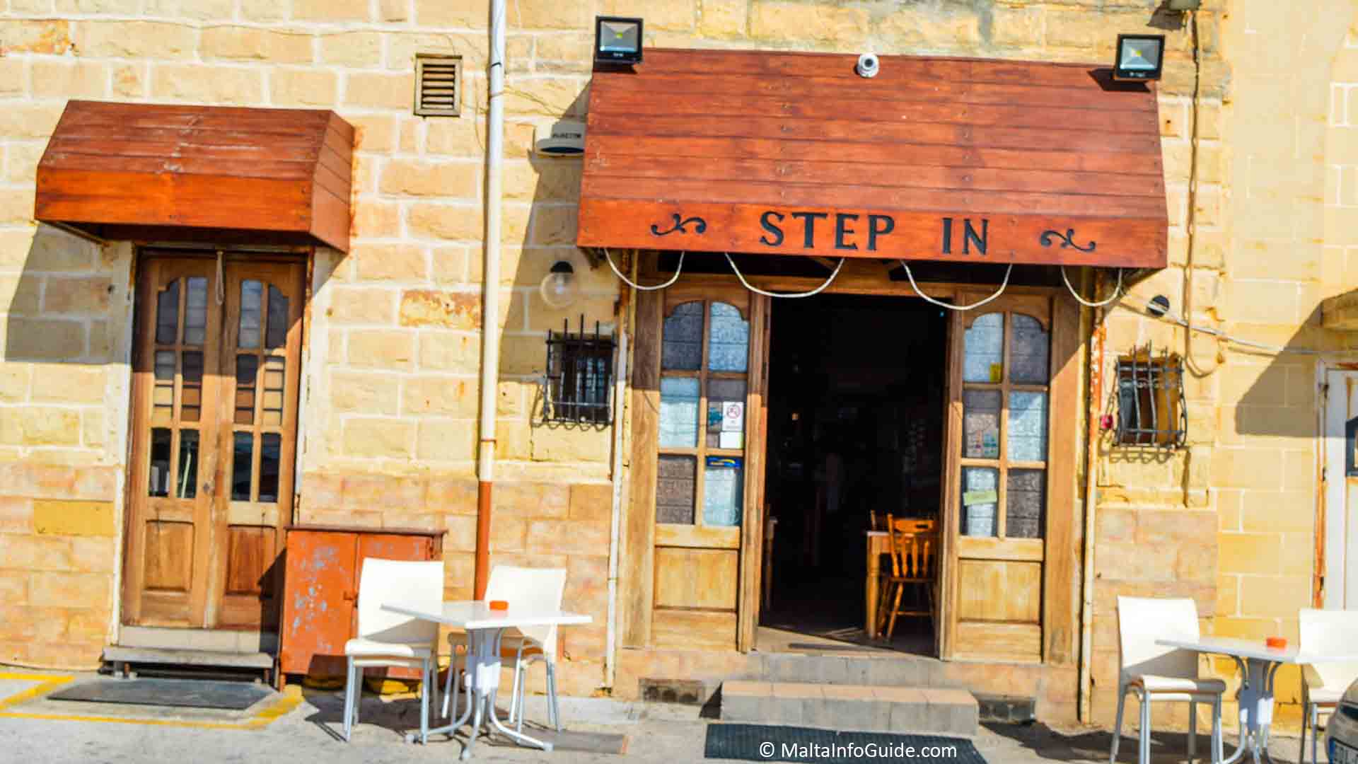 The outside of the Step In restaurant.