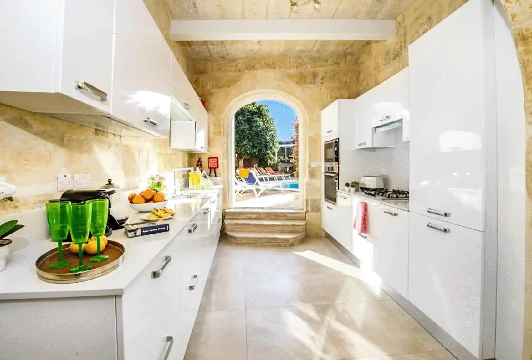 Sulda Brill Holiday Home, Nadur, Gozo, Malta, modern farmhouse kitchen, stone features, pool access.