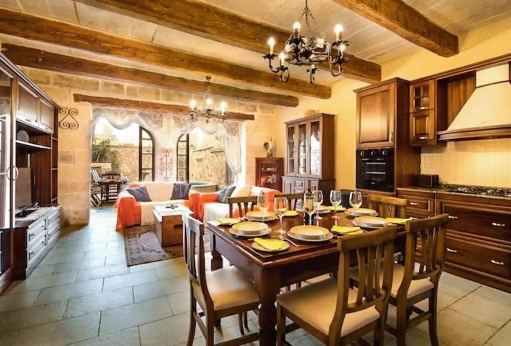 Ta’ Manwel Farmhouse, Nadur, Gozo, Malta,  traditional stone interior with open-plan living and dining.