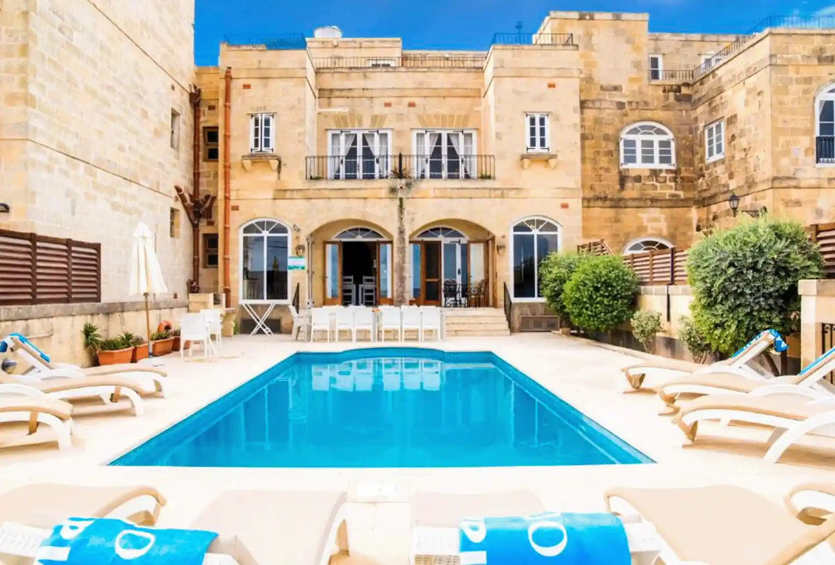 Ta’ Trudy Farmhouse, Sannat, Gozo, Malta,  traditional courtyard with private swimming area.