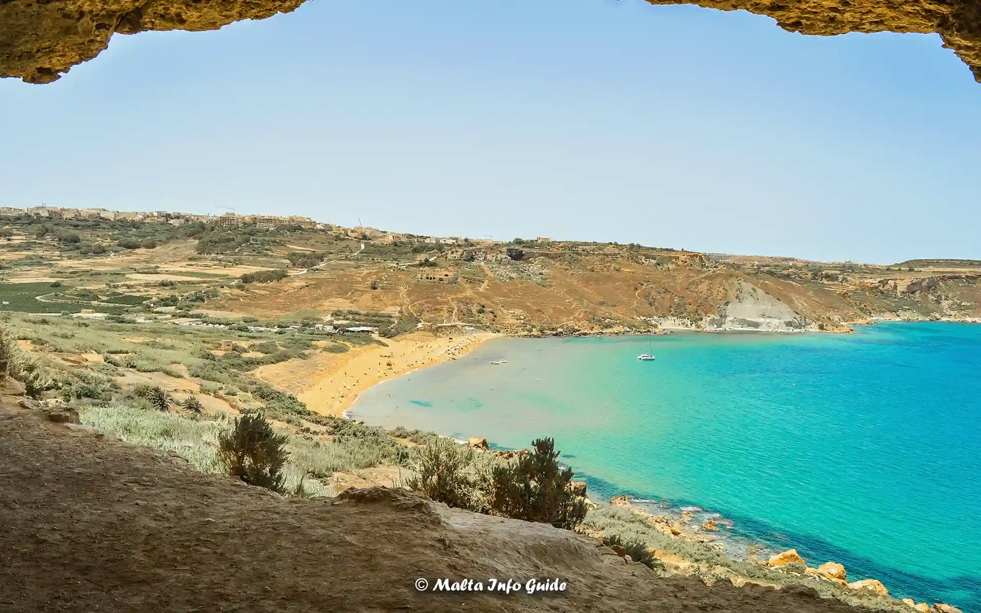 View of Ramla Bay beach in Gozo from Mixta Cave's entrance.