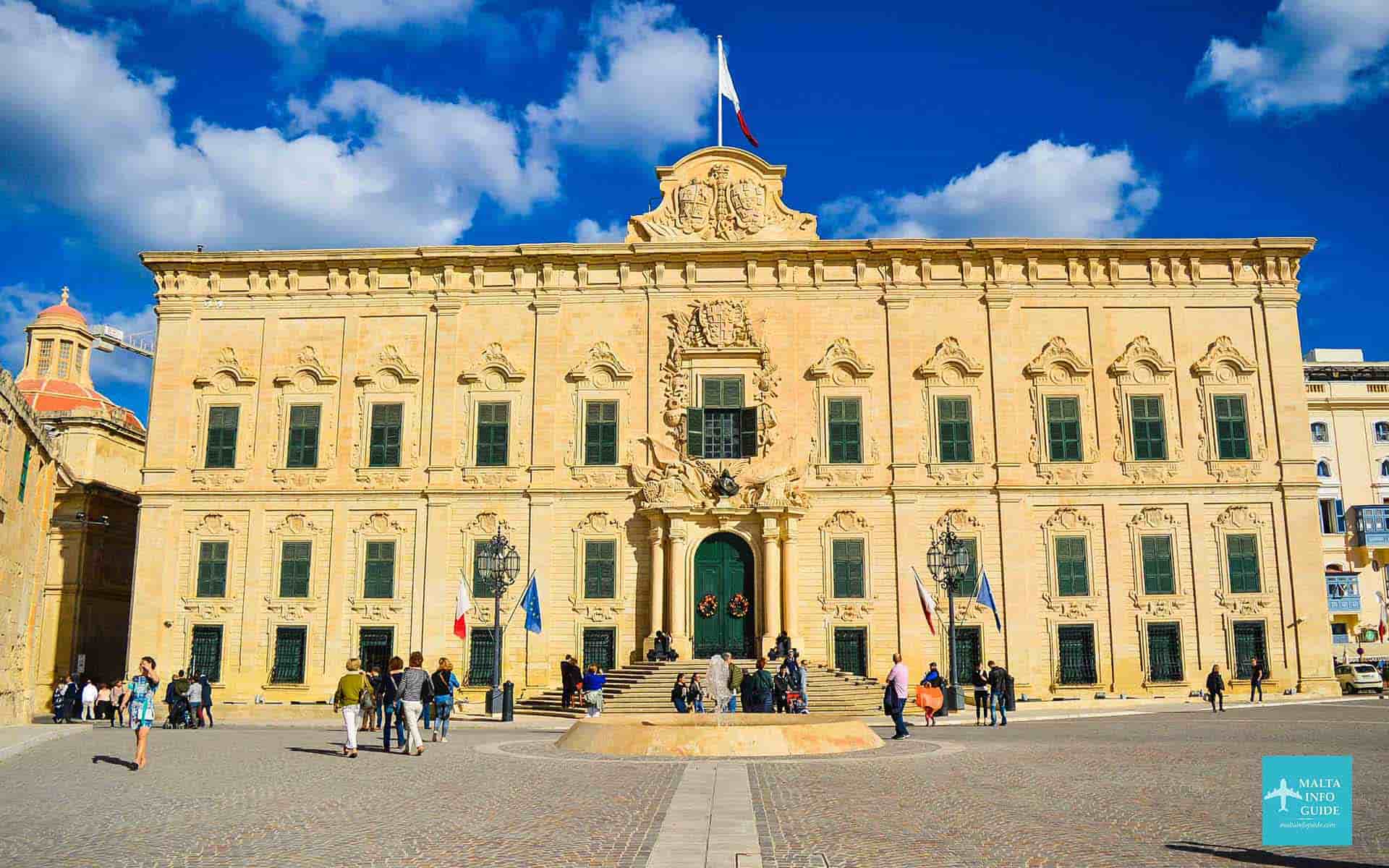 People walking at the Auberge de Castille square. People walking at the Auberge de Castille square.