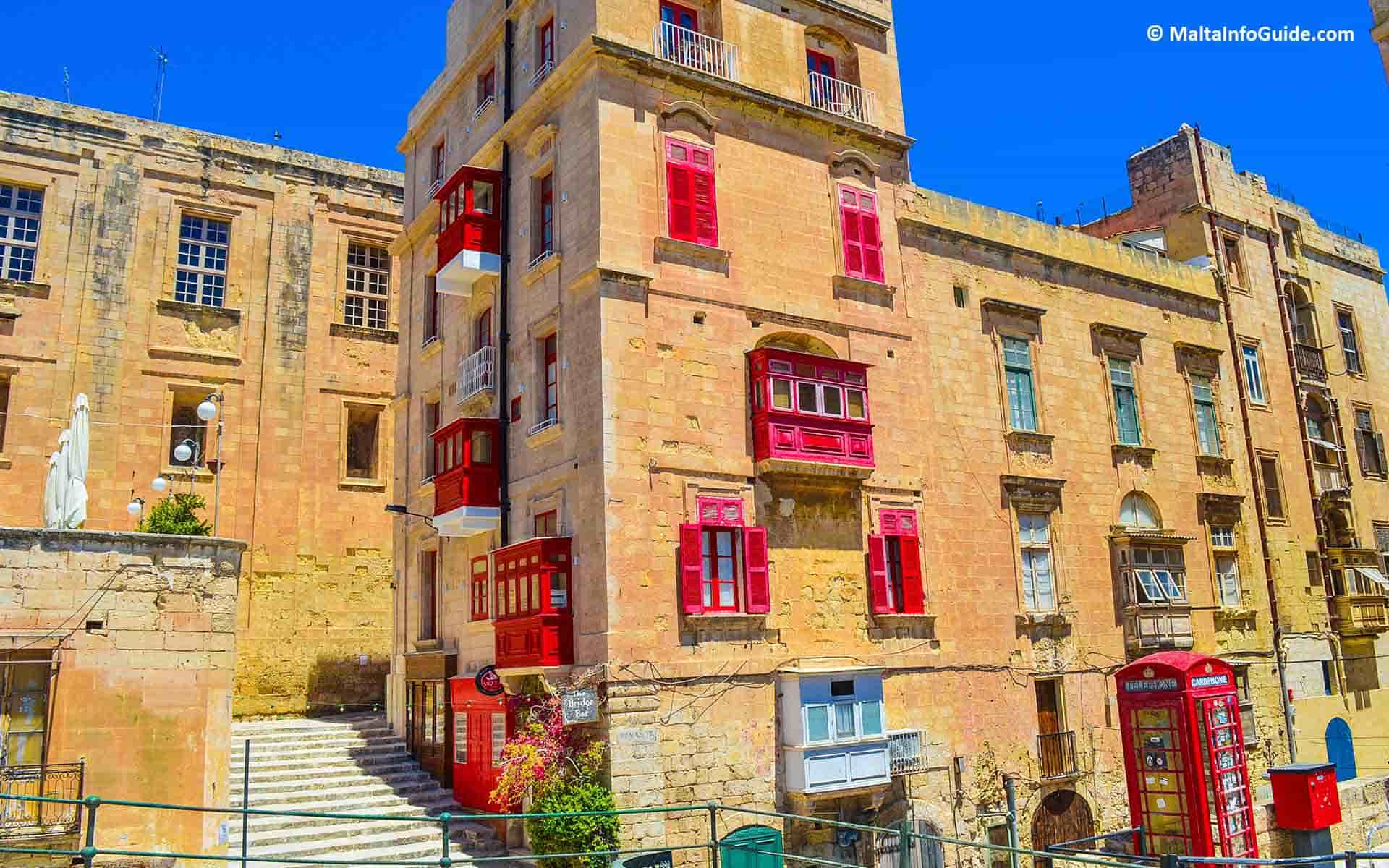 Bright red balconies at the south of Valletta. Bright red balconies at the south of Valletta.