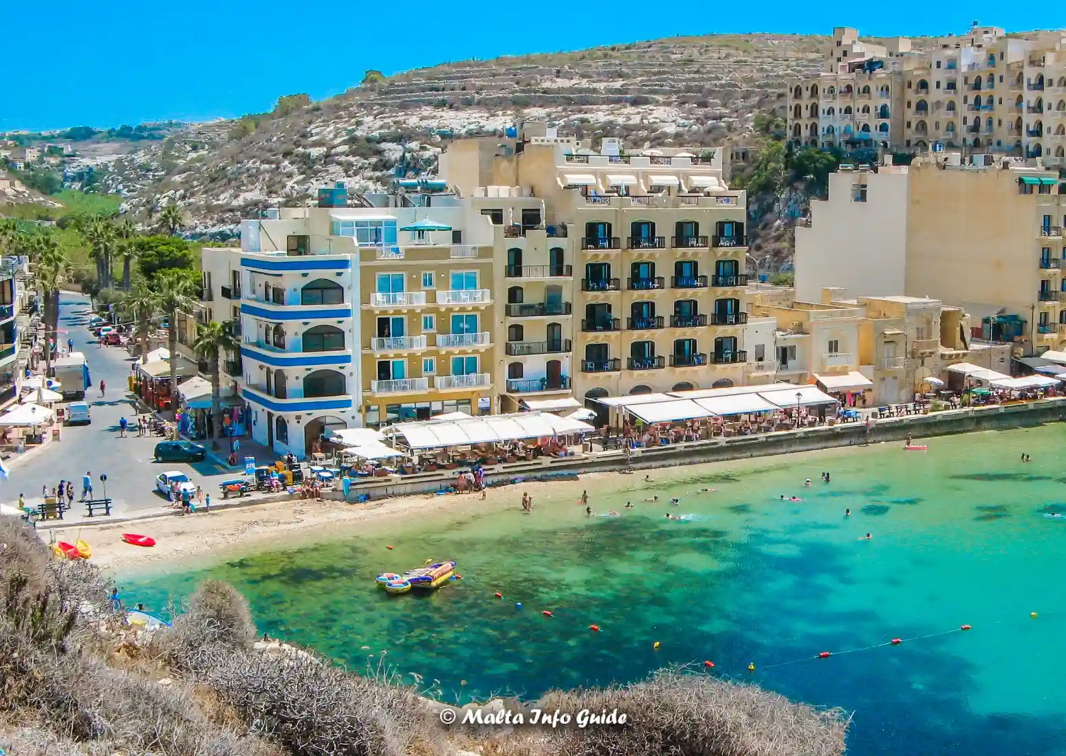 Xlendi Bay in Gozo, with its small beach and waterfront.